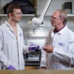 John Reynolds and Brian Schmatz in Reynolds' lab